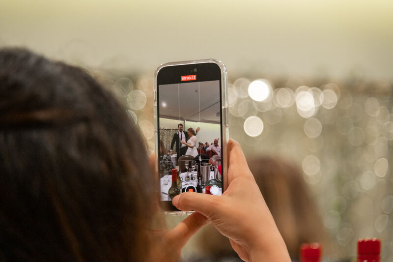 Dancing captured through a phone screen